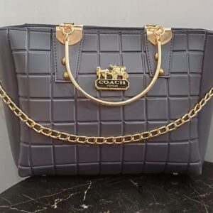 Grey quilted handbag with gold chain accents