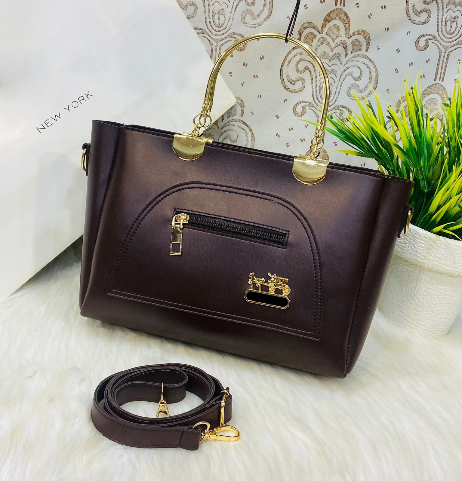 Stylish Brown Handbag with Gold Accents & Detachable Strap