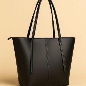 sleek black structured tote bag for women with double shoulder straps and minimalist stitching
