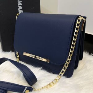 Navy blue Charles & Keith crossbody bag with gold chain strap
