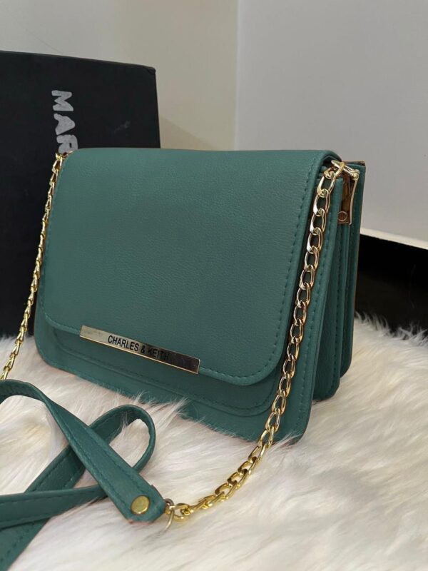 Charles & Keith green crossbody bag with gold chain strap