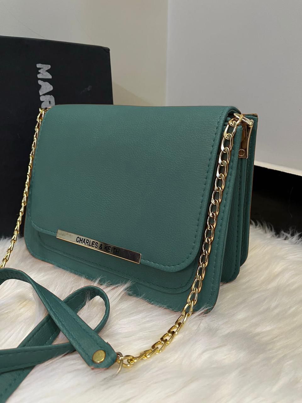 Charles & Keith green crossbody bag with gold chain strap