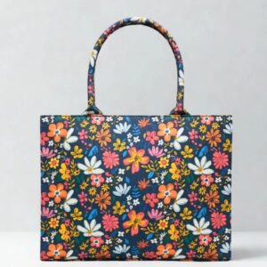 Floral printed structured tote bag for women with black base and colorful design
