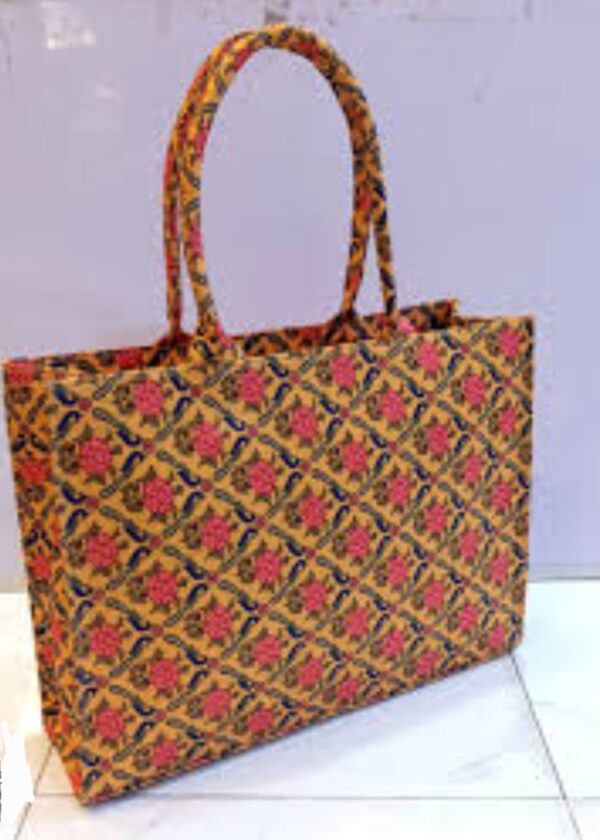 Woman carrying stylish ethnic tote bag – perfect for work, shopping, or casual outings