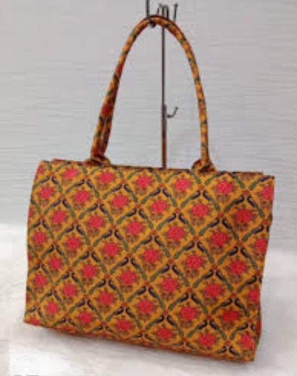 Woman carrying stylish ethnic tote bag – perfect for work, shopping, or casual outings