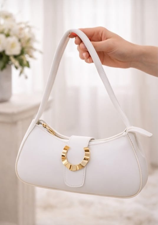 Elegant white shoulder bag with curved moon design