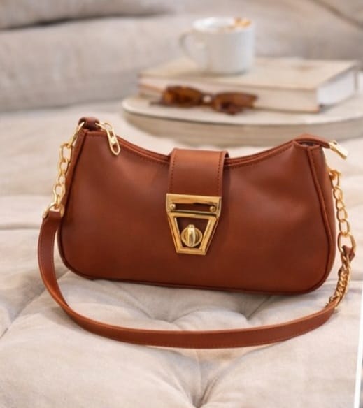 Elegant rust colour leather shoulder bag by Zwore